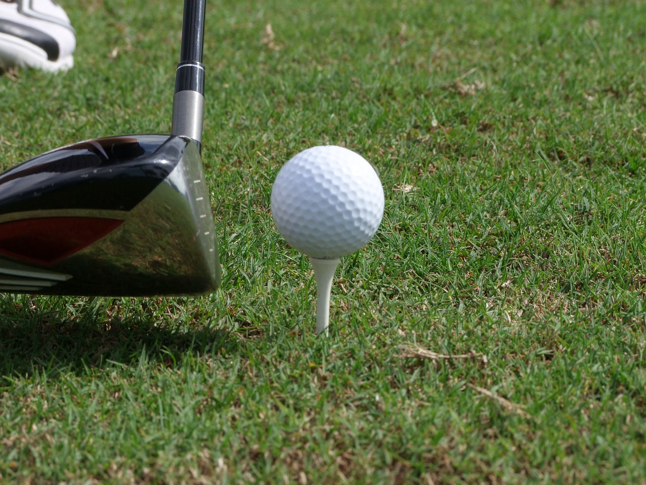 Golfpallo ja -maila